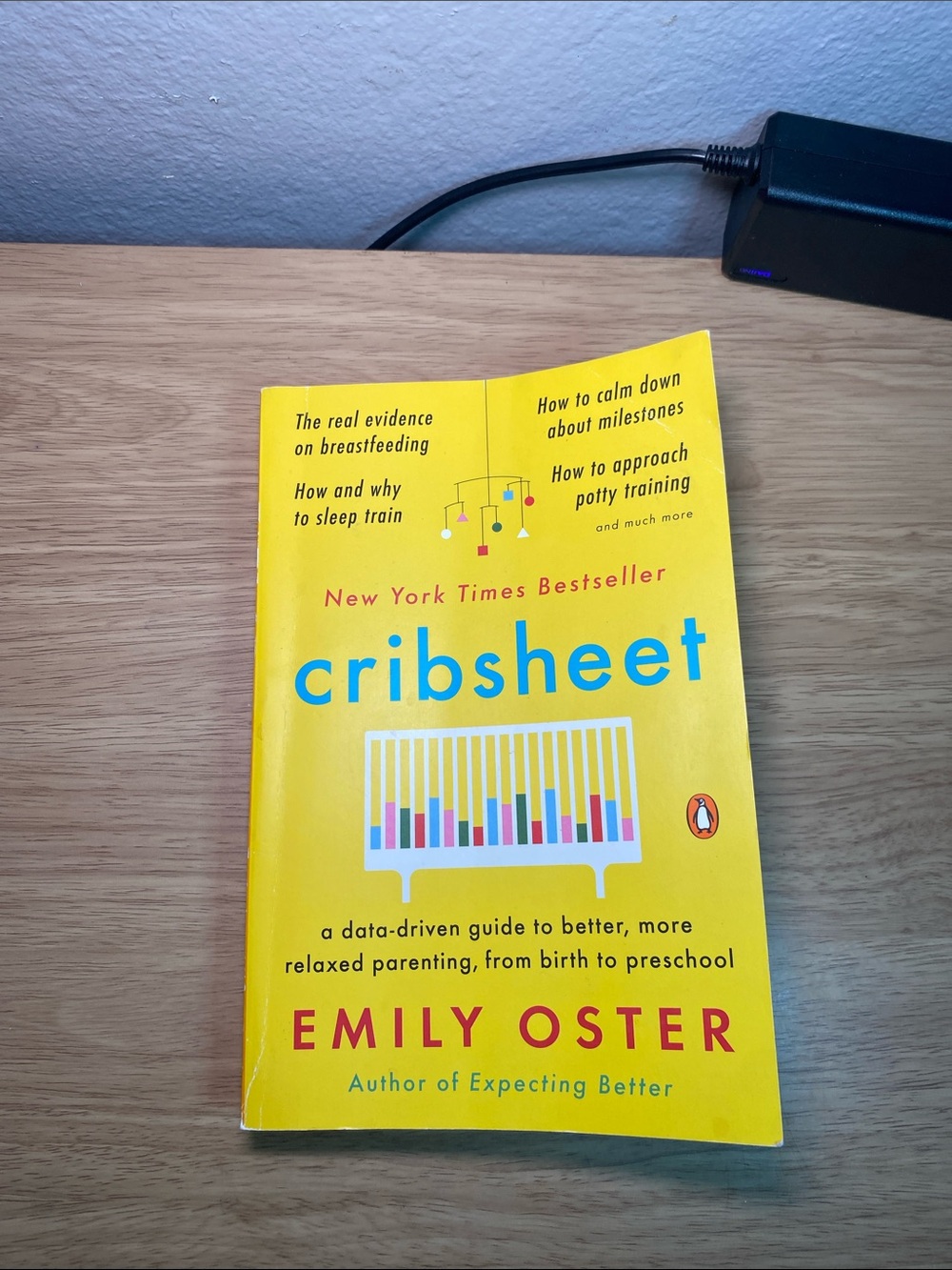 Cribsheet by Emily Oster - Bright Yellow Paperback